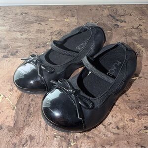 Place Black Dress Shoes with Bow